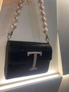 Embellished Mini Black Clutch with Pearl Handle