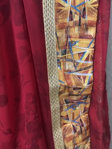 Red Saree With Yellow Design Border.