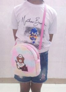 NEW NO USED SLING BEG FOR KIDS.