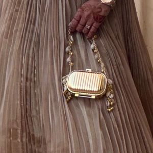 Unique Gold Clutch with Shell Details