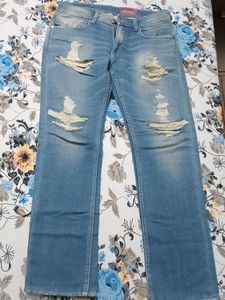 Ripped Jeans - Light Wash Denim