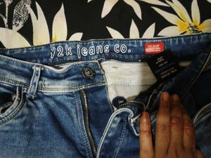 Distressed Blue Denim Jeans