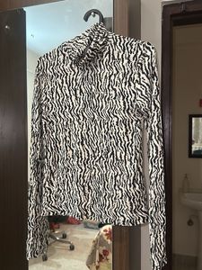 Zebra Print Turtleneck Top