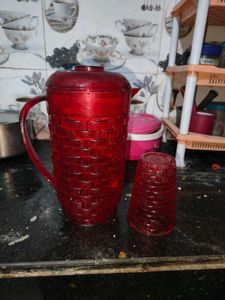 Red Plastic Pitcher with Glass
