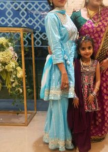 kurta (top), palazzo pants, and a dupatta (scarf).