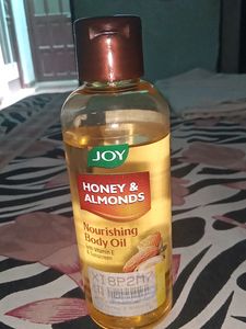 Joy Nourishing Body Oil With VITAMIN E And Sunscreen
