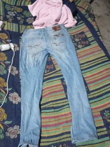 Ripped Blue Denim Jeans