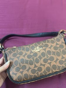 Coach Clutch sling Bag