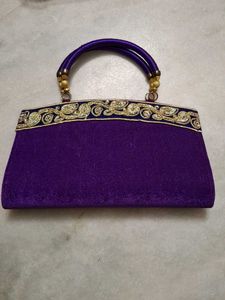 Red,rani pink, and purple Embroidered Clutches
