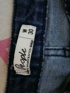 Ripped Knee Skinny Jeans