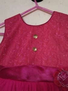 Pink Net Dress With Proper Lining Inside.
