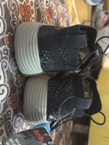 Action Sneakers - New with Tag