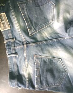 Distressed Blue Denim Jeans