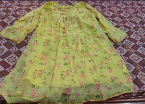 A flowing beautiful Yellow Color western dress