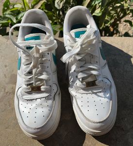 Nike Airforce 01 White Colour With A Bit Of Green.