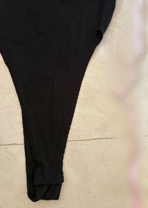 Chic Black Ribbed Bodysuit