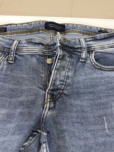 Distressed Denim Jeans