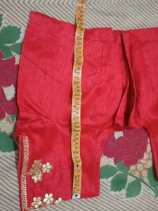 Beautiful Carrot Colour Blouse With Back Design