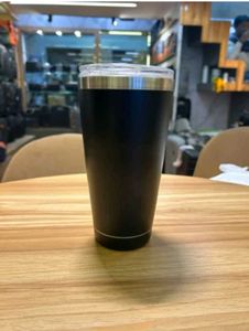 Black Tumbler and Lid With Thermal control.