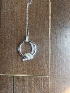 Elegant Silver Knot Pendant/new