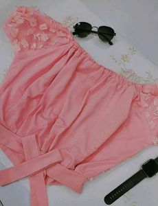 skirt or shorts with floral embellishments.