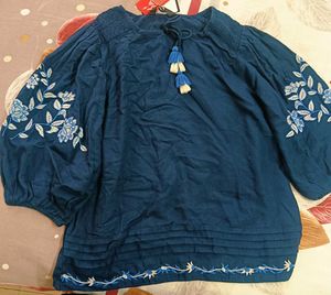 Blue Top With Tag