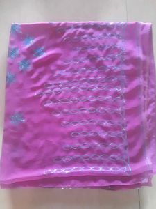 Ambroider saree with blouse.