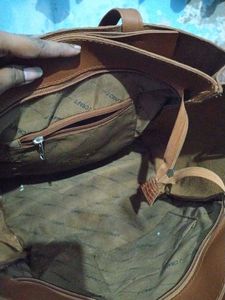 A Big Size Tote Bag With Enough Space For Laptop