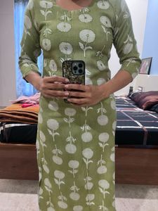 Green kurta.