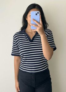 Stripes never go out of style Grab this classy pol