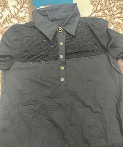black frill top