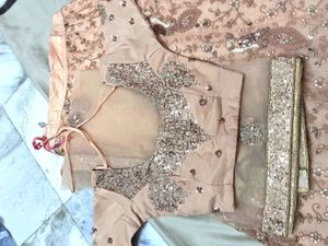 Peach Embroidered Lehenga Choli