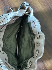 Beige colour big handbag bag