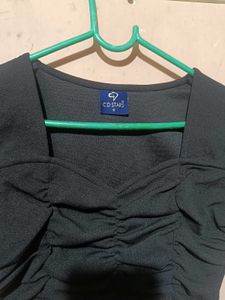 A Ruffled Black Crop Top