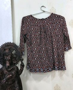 Red Printed Tie-up Neck Blouse