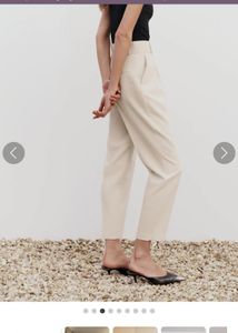 Beige belted trousers