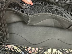 Chic Black Dress with Lace Hem
