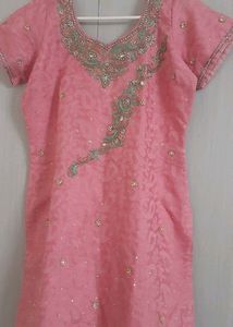 A Very Preety Pink embroided Kurta & Plain pajami