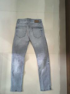 Distressed Gray Skinny Jeans