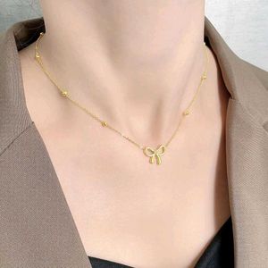 Gold Bow Necklace
