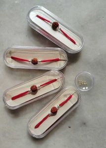 Pure Gold Earring Or Nosepin and Silver Rakhi