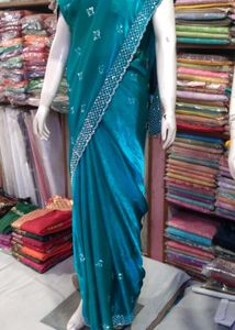 Teal Saree with Silver Embellishments