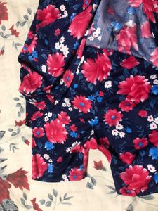 Swim Suit With Attached Shorts.