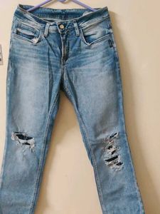 Ripped Blue Denim Jeans