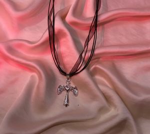 🌷⛓️🩸Lana Del Rey Coded Winged Cross Necklace