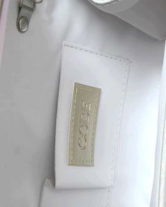 Code by Lifestyle White Shimmer Clutch