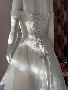High low white organza-lace gown