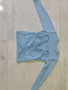 A Blue Crop Top With Crochet