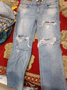 Ripped Light Wash Denim Jeans