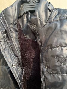 Almost brand new sleeveless black jacket